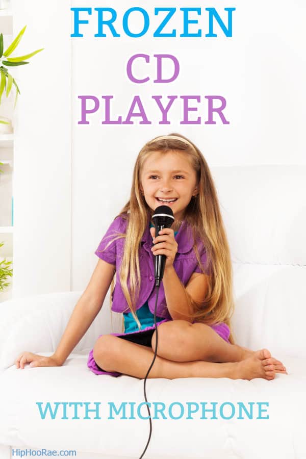 Young Girl singing with Frozen CD Player with Microphone