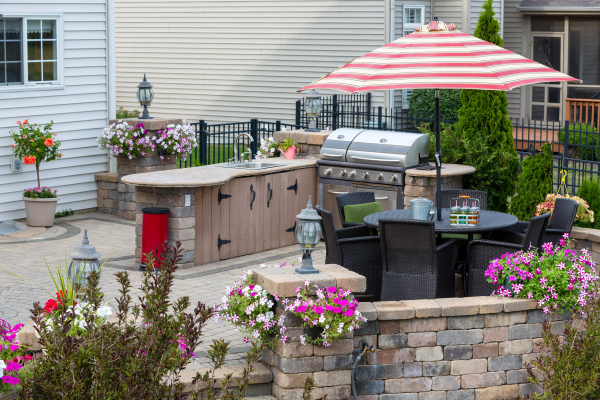 Outdoor kitchen with BBQ and Umbrella