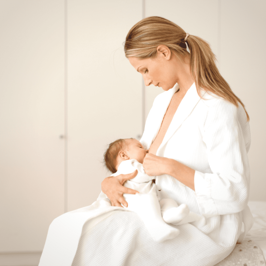 Breast feeding mom with newborn baby