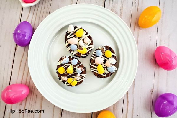 Easter egg shaped brownies on white plate