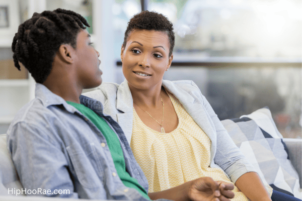 mother talking to teen son about periods