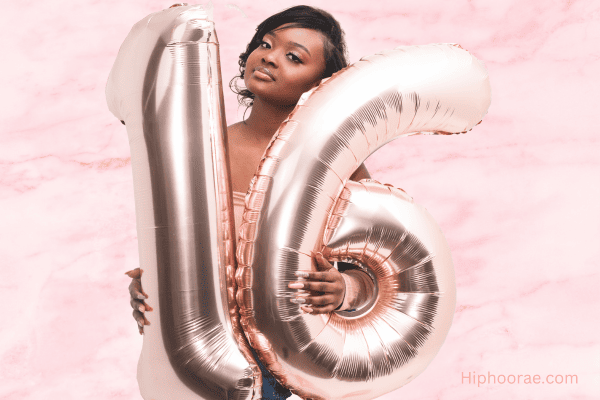 sweet 16 girl holding party balloons