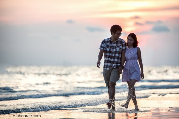 Couple walking at the beach