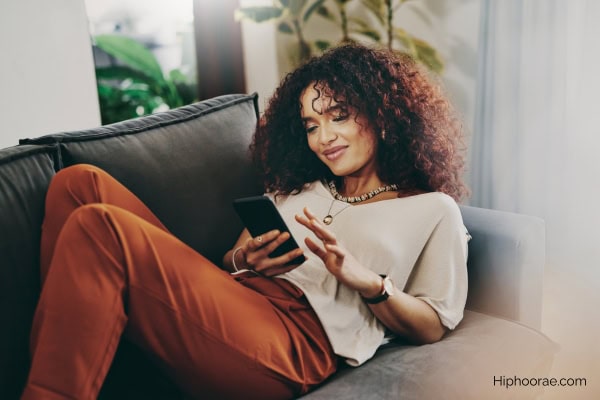 Woman on phone using dating app