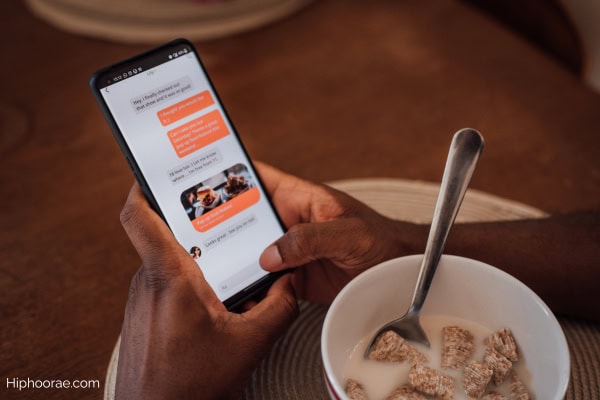Someone using a dating app on phone