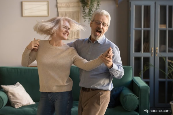Couple dancing at home