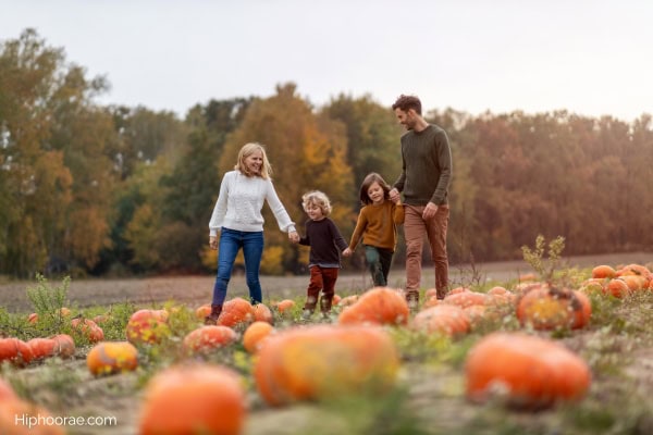 Family visiting a pumpkin patch