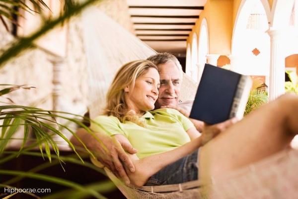 Couple reading a book together