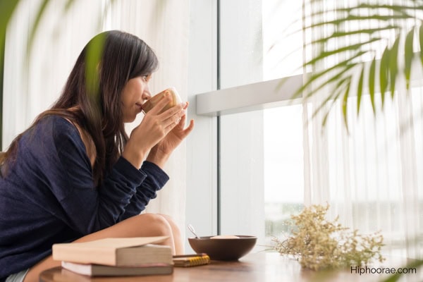 woman drinking tea in the morning
