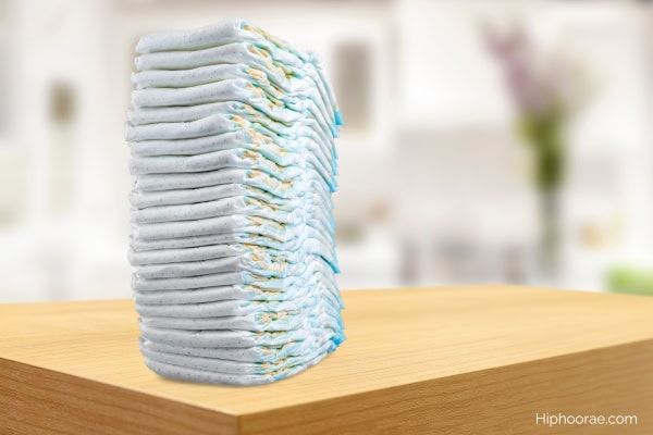 tall stack of diapers