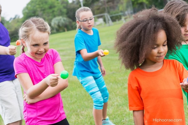 kids on egg spoon race