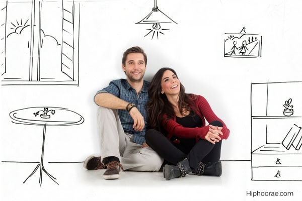smiling couple dreaming about their future home