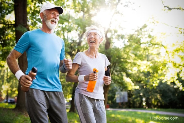 senior couple running outdoors