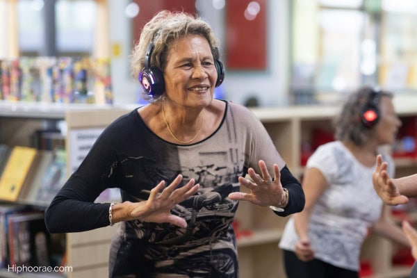 seniors wearing headset while dancing