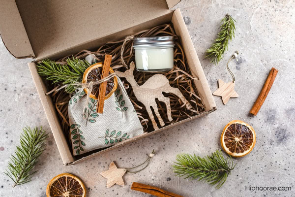 Christmas gift box with pouch, candle, wooden toy ornament