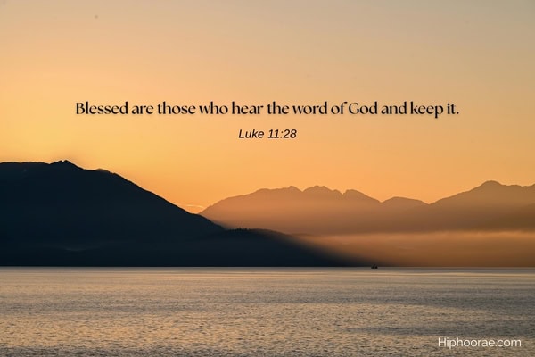 serene mountainous coast line with bible quote overlay