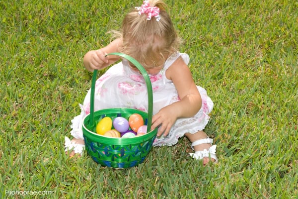 Little girl on an Easter egg hunt