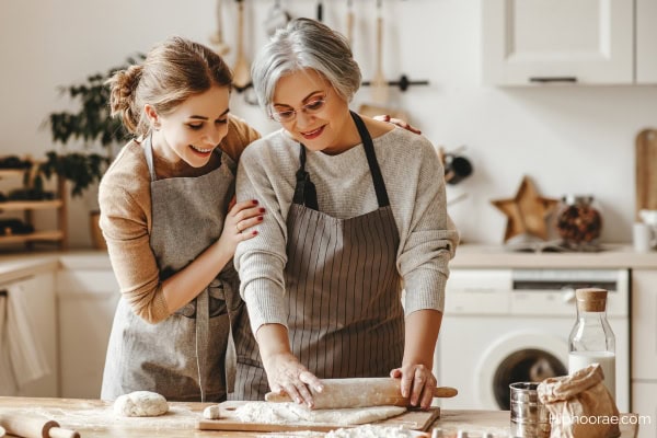 daughter and mother in law in the kitchen