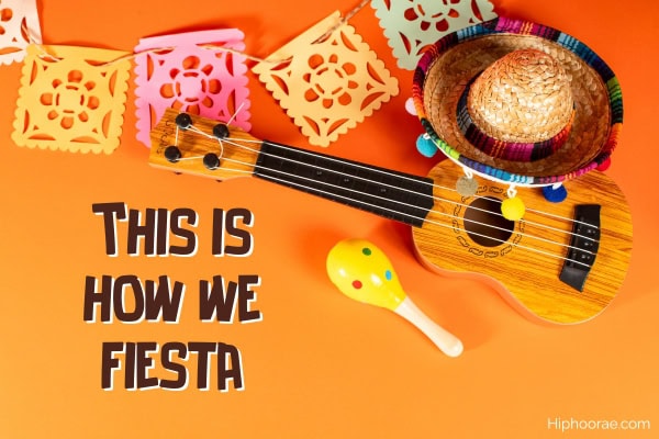 Cinco de Mayo background of ukelele, maracas, mexican hat