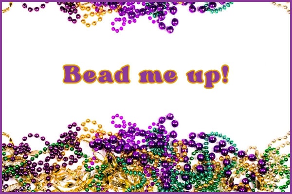 Mardi gras colorful beads with quote overlay
