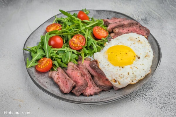 steak and eggs with salad