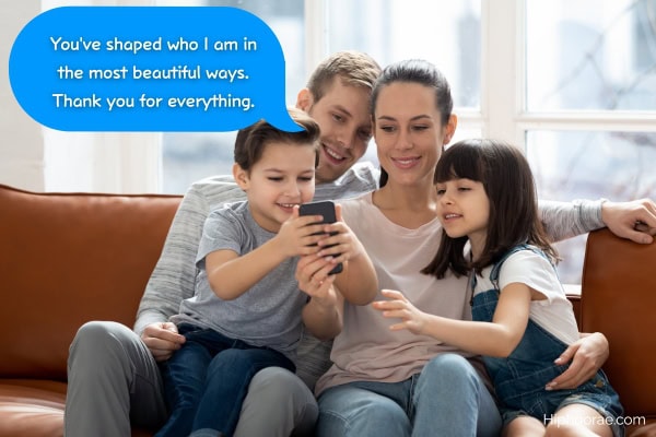 Parents with 2 kids looking at cellphone, with quote on message bubble overlay