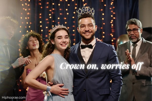 Teenage boy and girl wearing crowns for prom night with quote overlay