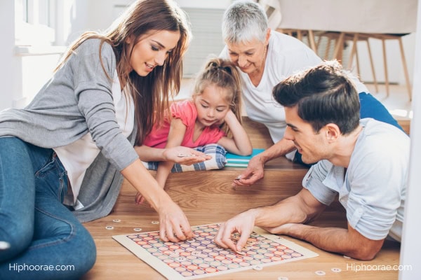 family playing a board game