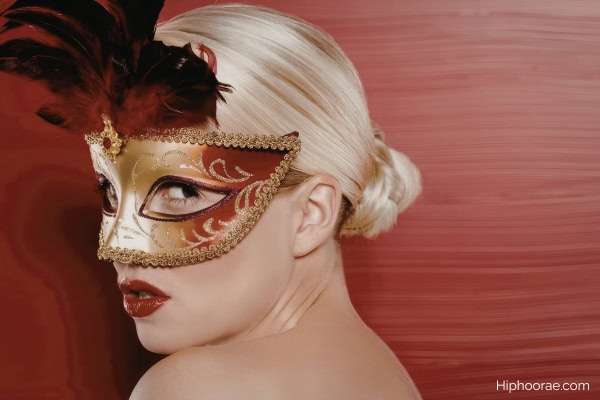 woman wearing a masquerade party mask
