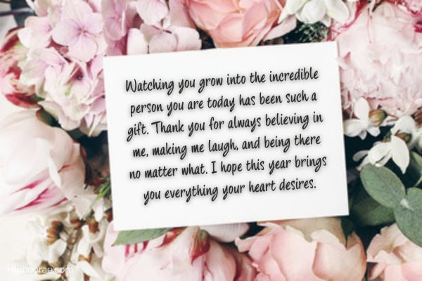 pink roses background with birthday message on white card overlay